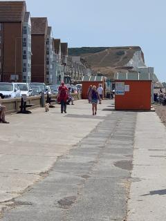 Walking through Seaford - uh oh, that's the path up that cliff!